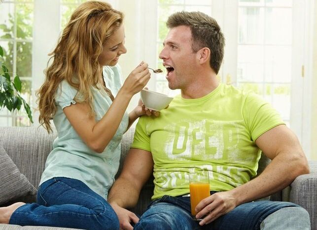 the woman feeds male products to increase potency